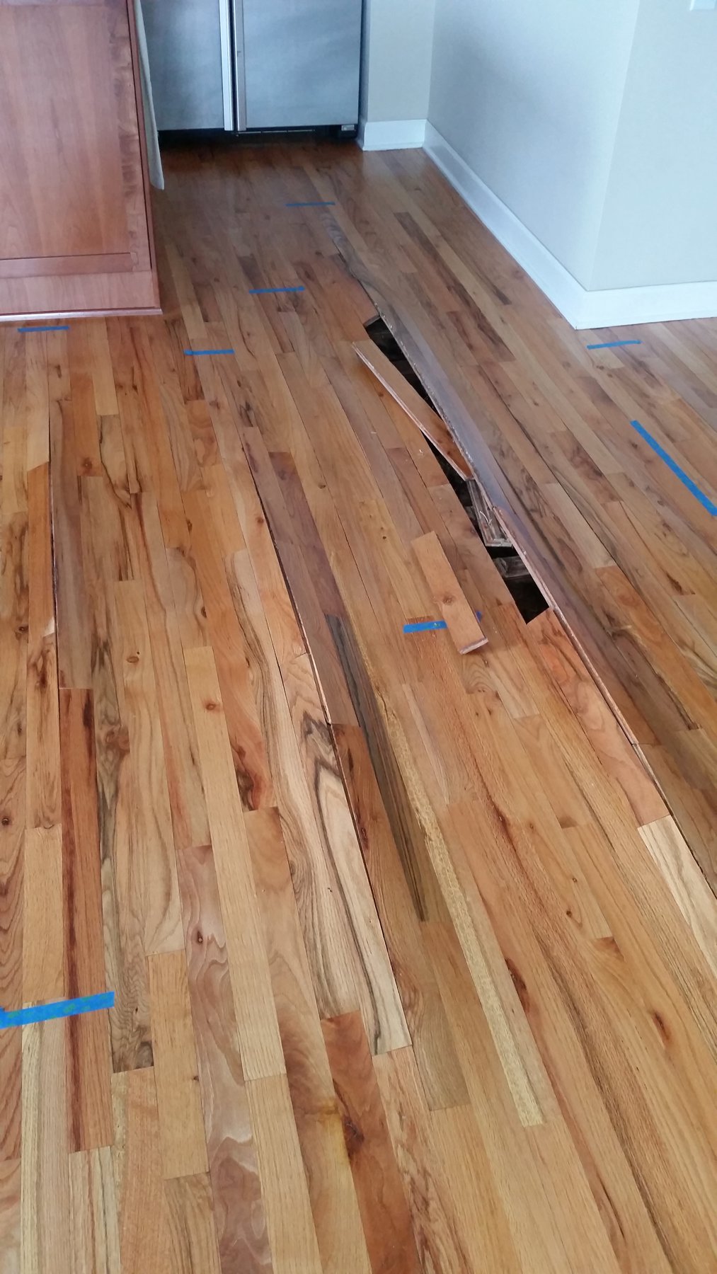 Repairing water damaged hardwood floors Mr. Floor Chicago